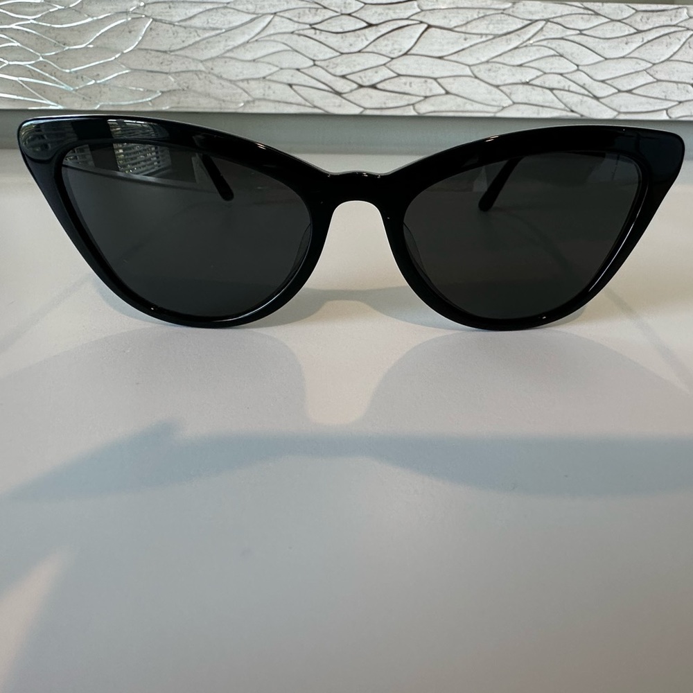 Prada
56MM Cat Eye Sunglasses
One Size
Black
